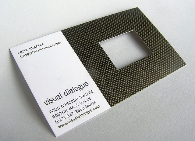 business card with a hole cut out